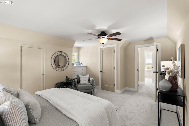 226 N Highland St, Portland, OR 97217 - bedroom with light carpet, baseboards, ceiling fan, and lofted ceiling