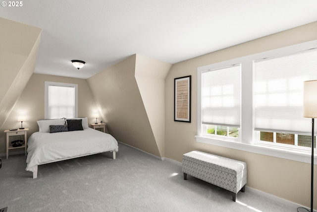 226 N Highland St, Portland, OR 97217 - carpeted bedroom with multiple windows and baseboards