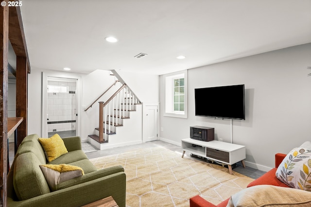 226 N Highland St, Portland, OR 97217 - living area featuring stairway, recessed lighting, and baseboards