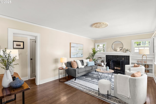 226 N Highland St, Portland, OR 97217 - living area with ornamental molding, wood finished floors, plenty of natural light, a tile fireplace, and baseboards