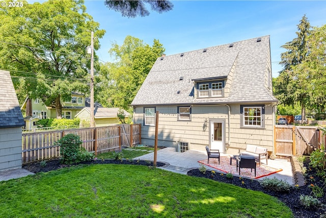 226 N Highland St, Portland, OR 97217 - back of house featuring a patio area and a shingled roof