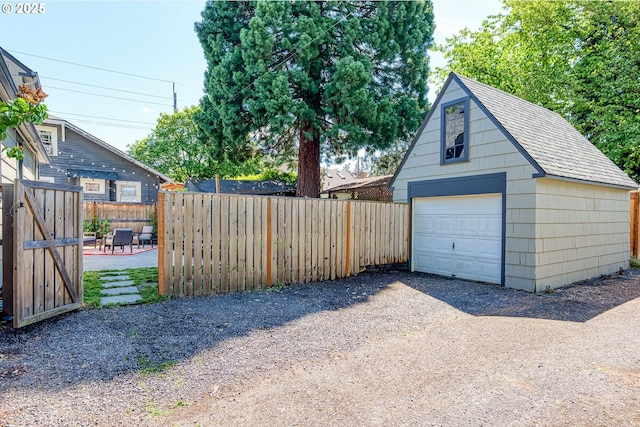 226 N Highland St, Portland, OR 97217 - detached garage with dirt driveway