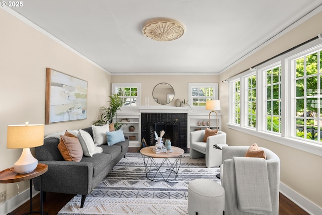226 N Highland St, Portland, OR 97217 - living area featuring crown molding, healthy amount of natural light, wood finished floors, baseboards, and a brick fireplace
