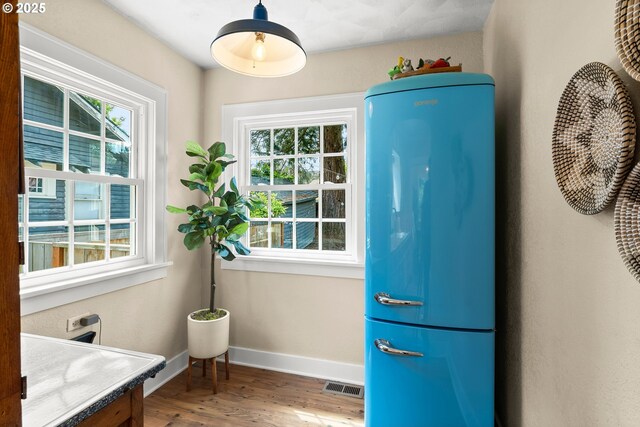 226 N Highland St, Portland, OR 97217 - entryway featuring wood finished floors and baseboards