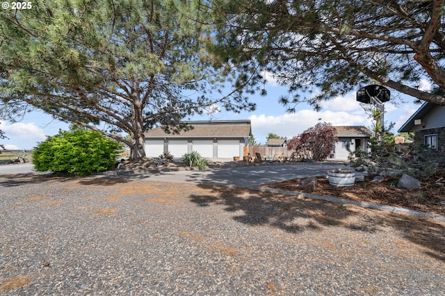 view of front facade with driveway and a garage