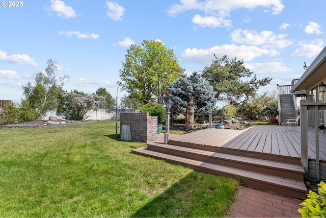 exterior space with stairway and a yard