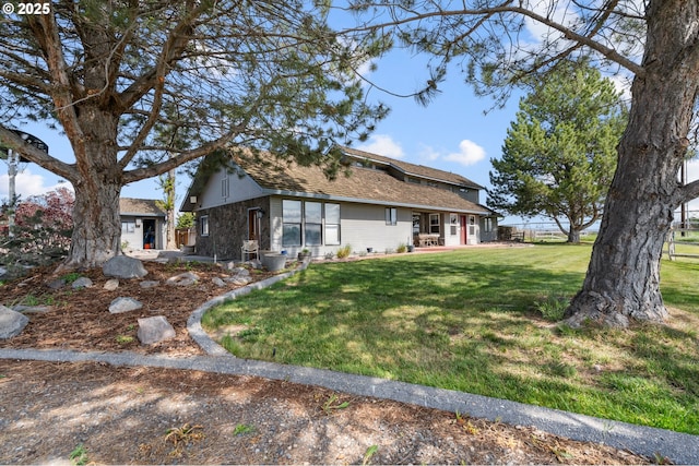exterior space featuring a yard