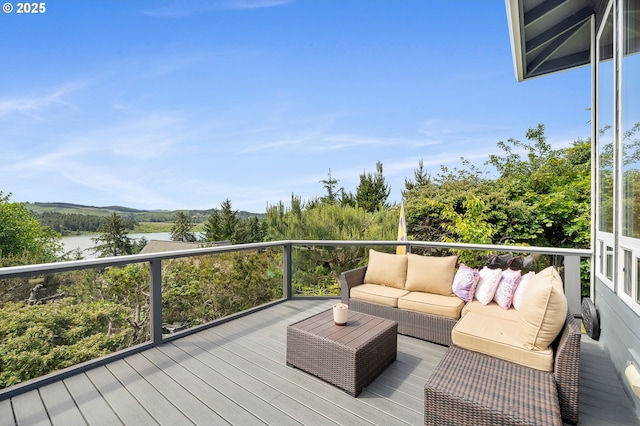1626 NE Regatta Way, Lincoln City, OR 97367 - deck featuring an outdoor living space and a water view