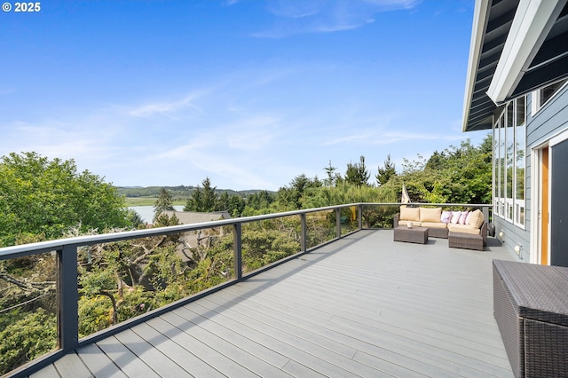 1626 NE Regatta Way, Lincoln City, OR 97367 - deck featuring an outdoor hangout area and a water view