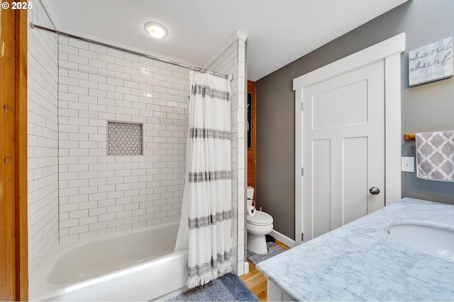 1626 NE Regatta Way, Lincoln City, OR 97367 - bathroom with vanity, shower / tub combo, toilet, wood finished floors, and baseboards
