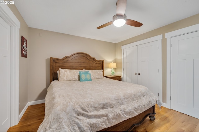 1626 NE Regatta Way, Lincoln City, OR 97367 - bedroom with light wood-style floors, baseboards, a closet, and ceiling fan