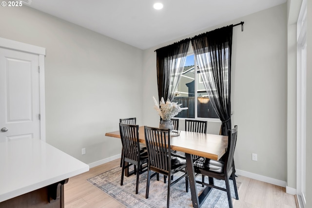 dining area featuring light hardwood / wood-style flooring