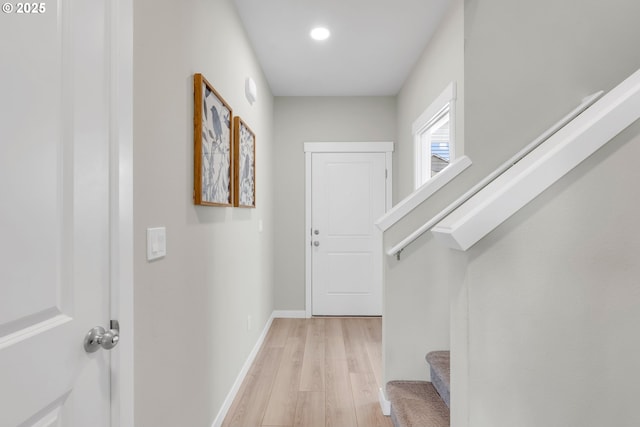 hallway featuring light wood-type flooring