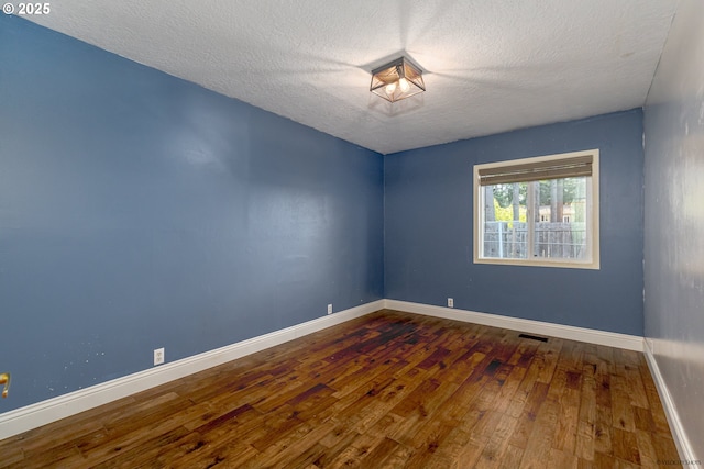 35538 SE Snuffin Rd, Estacada, OR 97023 - unfurnished room with wood-type flooring, a textured ceiling, and baseboards