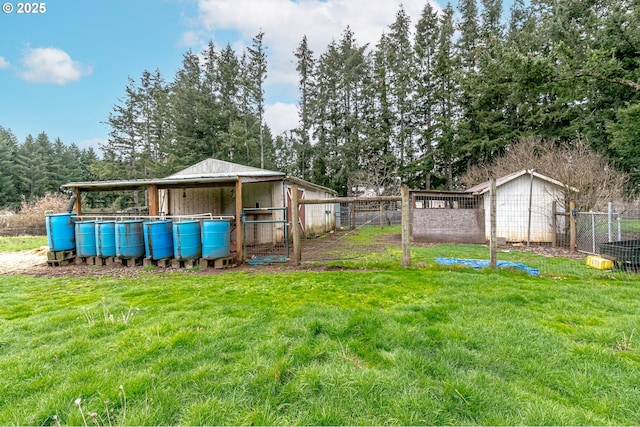 35538 SE Snuffin Rd, Estacada, OR 97023 - view of yard with an outdoor structure and view of wooded area