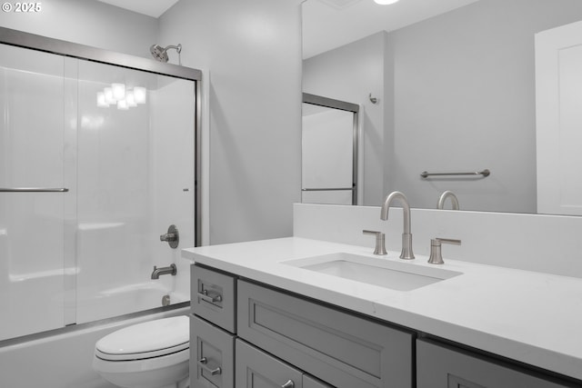 35681 Bella Ridge Loop, Astoria, OR 97103 - full bathroom with toilet, shower / bath combination with glass door, and vanity