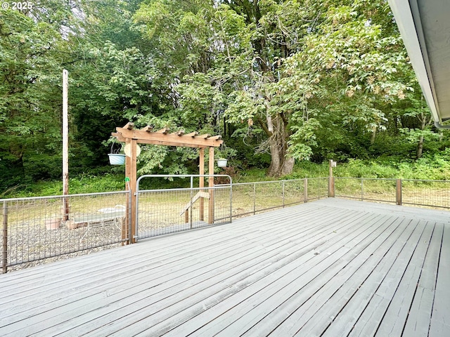 wooden deck featuring fence