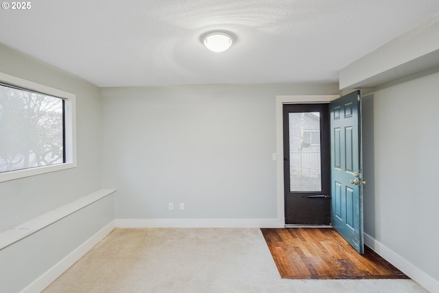 entrance foyer with a textured ceiling