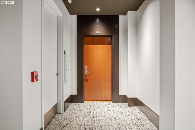 1025 NW Couch St Unit 1320, Portland, OR 97209 - hall with recessed lighting and elevator