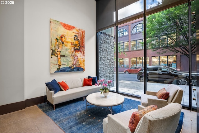 1025 NW Couch St Unit 1320, Portland, OR 97209 - tiled living room with a towering ceiling