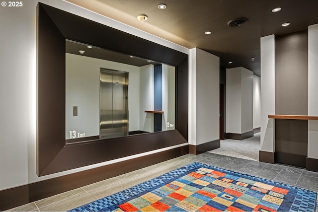 1025 NW Couch St Unit 1320, Portland, OR 97209 - interior space with tile patterned flooring, elevator, and recessed lighting