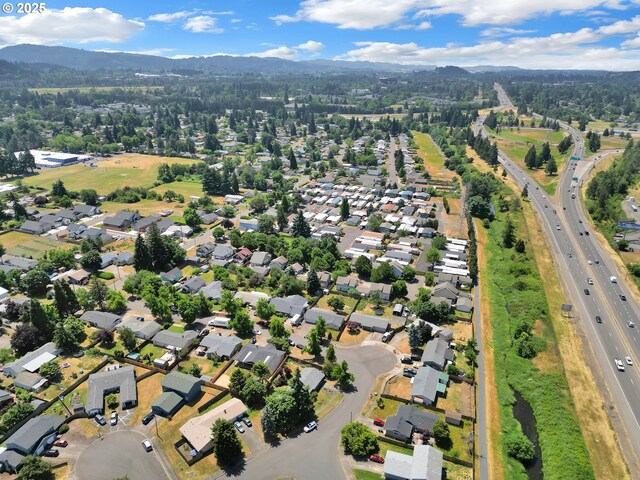 814/816 W Quinalt St, Springfield, OR 97477 - aerial view of property and surrounding area with a mountain backdrop and nearby suburban area