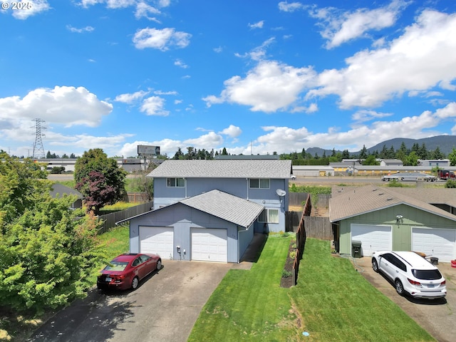 814/816 W Quinalt St, Springfield, OR 97477 - view of front of home featuring a mountain view, a garage, and a shingled roof