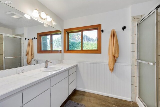 11081 Cook Underwood Rd, Underwood, WA 98651 - full bath featuring plenty of natural light, a wainscoted wall, an enclosed shower, and vanity