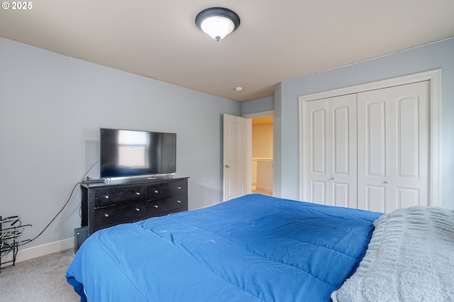10886 SW Bretton Ct, Portland, OR 97224 - bedroom featuring carpet, a closet, and baseboards
