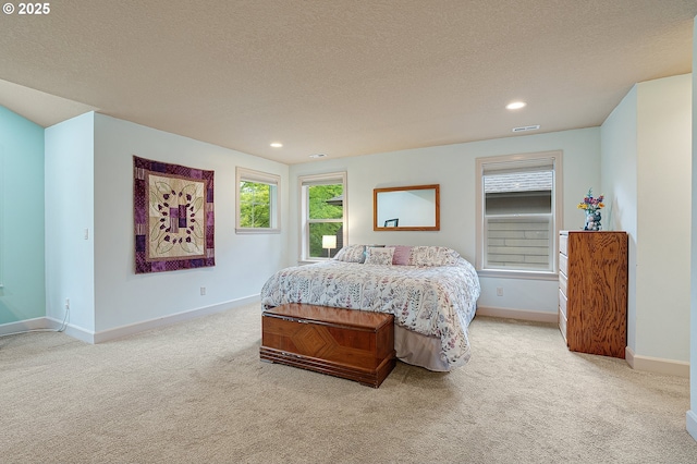 10886 SW Bretton Ct, Portland, OR 97224 - bedroom with light colored carpet, baseboards, a textured ceiling, and recessed lighting
