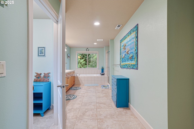 10886 SW Bretton Ct, Portland, OR 97224 - full bathroom with a bath, vanity, recessed lighting, baseboards, and a shower