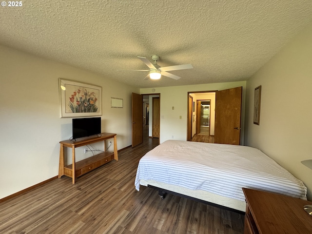 13821 NW 10th Ct Unit G, Vancouver, WA 98685 - bedroom with wood finished floors, a textured ceiling, baseboards, and ceiling fan