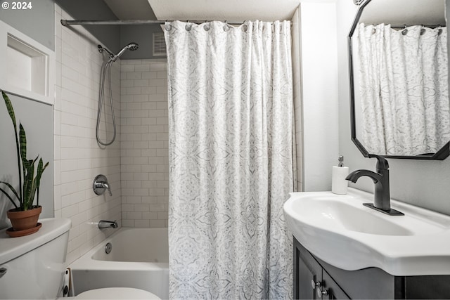 full bathroom featuring vanity, toilet, and shower / bath combo with shower curtain