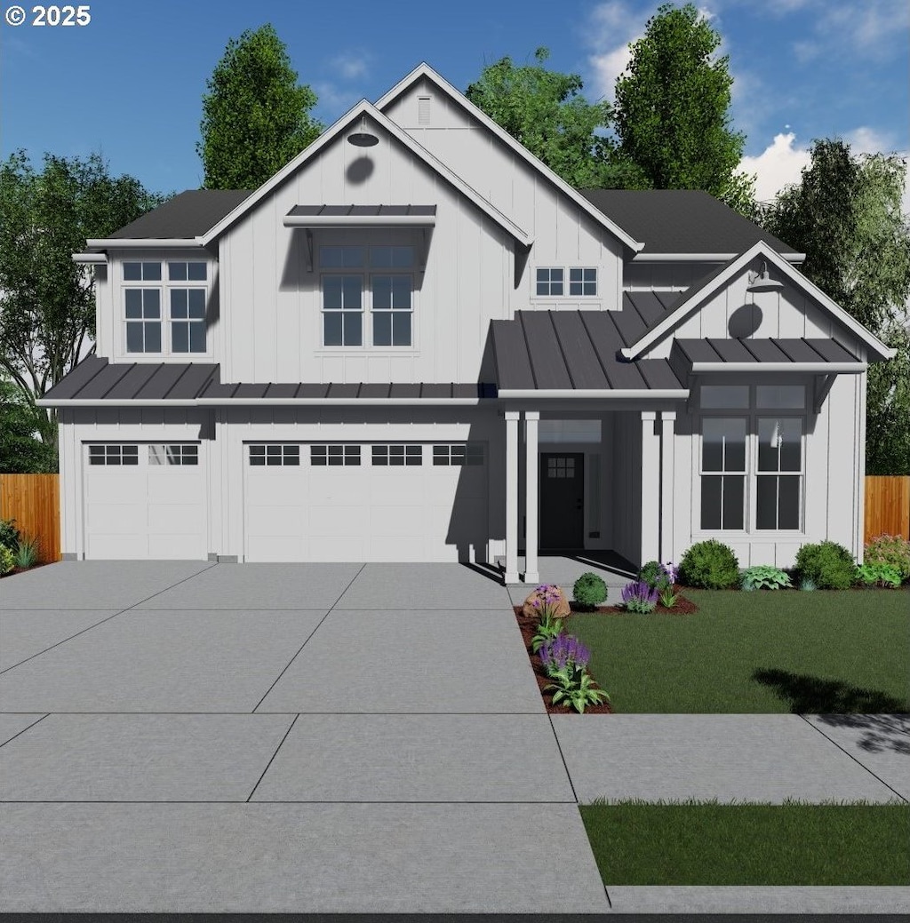 view of front of home featuring a garage and a front yard