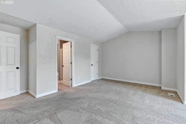 7091 SE Austin Dr, Hillsboro, OR 97123 - unfurnished bedroom featuring carpet flooring and lofted ceiling