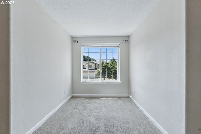 7091 SE Austin Dr, Hillsboro, OR 97123 - unfurnished room featuring carpet flooring and a textured ceiling