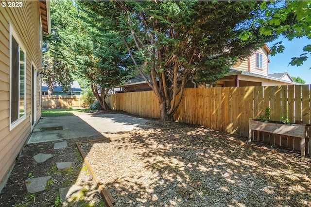 7091 SE Austin Dr, Hillsboro, OR 97123 - fenced backyard featuring a patio