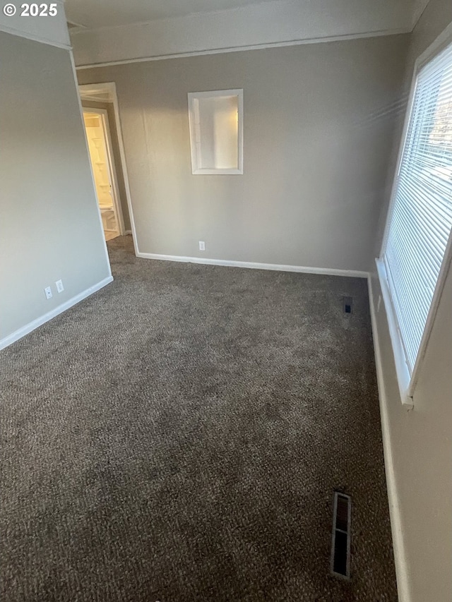 view of carpeted spare room