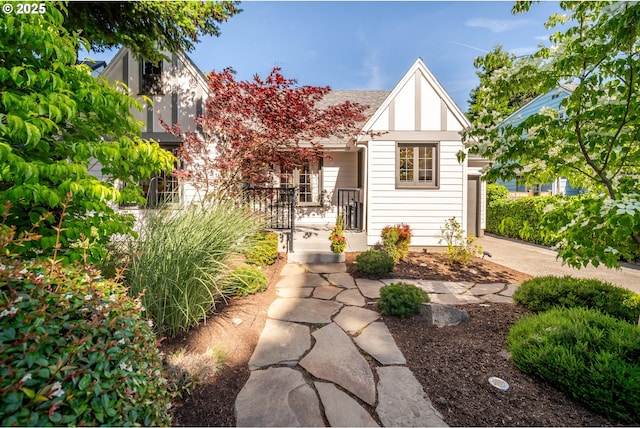 6406 N Michigan Ave, Portland, OR 97217 - tudor-style house featuring driveway