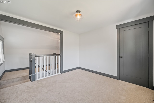 6406 N Michigan Ave, Portland, OR 97217 - carpeted empty room featuring baseboards