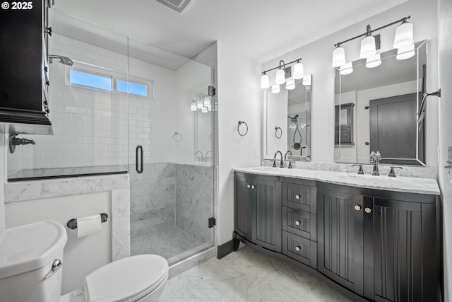 6406 N Michigan Ave, Portland, OR 97217 - full bathroom with toilet, marble look tile flooring, double vanity, and a stall shower