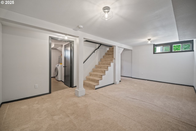 6406 N Michigan Ave, Portland, OR 97217 - below grade area featuring carpet flooring, washer / dryer, baseboards, and stairway