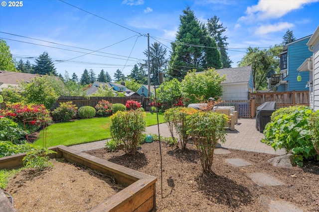 6406 N Michigan Ave, Portland, OR 97217 - view of yard with a patio area and a garden