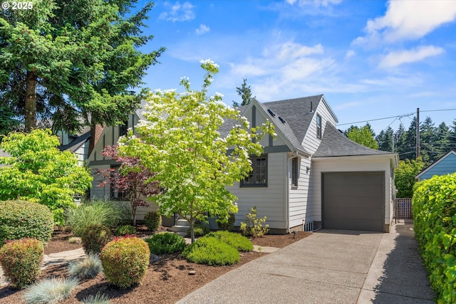 6406 N Michigan Ave, Portland, OR 97217 - view of front of property featuring an attached garage, driveway, and roof with shingles