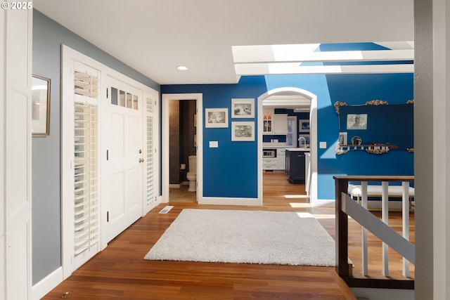 2977 Ingalls Way, Eugene, OR 97405 - entryway featuring arched walkways, recessed lighting, wood finished floors, and baseboards