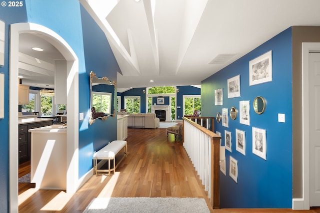 2977 Ingalls Way, Eugene, OR 97405 - corridor with wood finished floors, vaulted ceiling, and baseboards