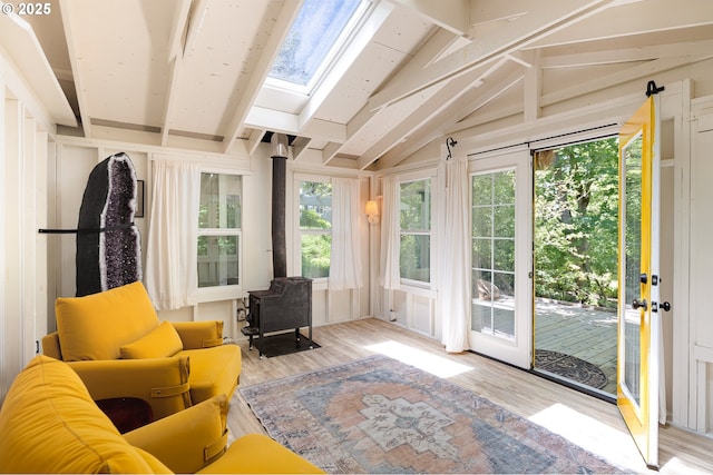 2977 Ingalls Way, Eugene, OR 97405 - sunroom with a wood stove and a skylight