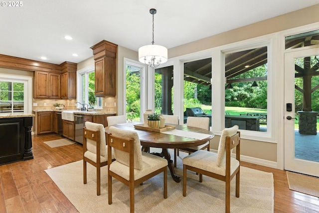 2812 Beacon Hill Dr, West Linn, OR 97068 - dining space with light wood-type flooring, a chandelier, and recessed lighting
