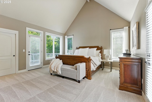 2812 Beacon Hill Dr, West Linn, OR 97068 - bedroom featuring light colored carpet, access to outside, and high vaulted ceiling