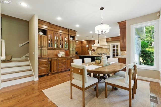 2812 Beacon Hill Dr, West Linn, OR 97068 - dining area featuring stairway, light wood finished floors, and recessed lighting